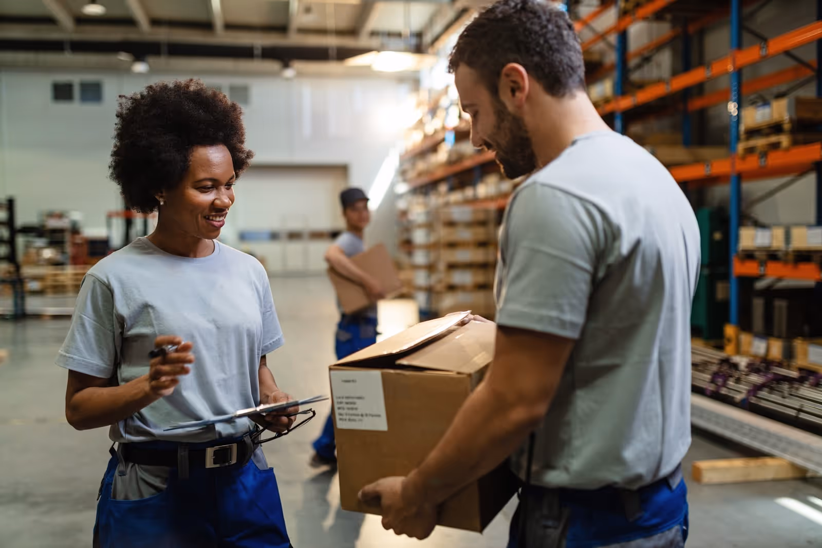 Two people working in procurement processes.